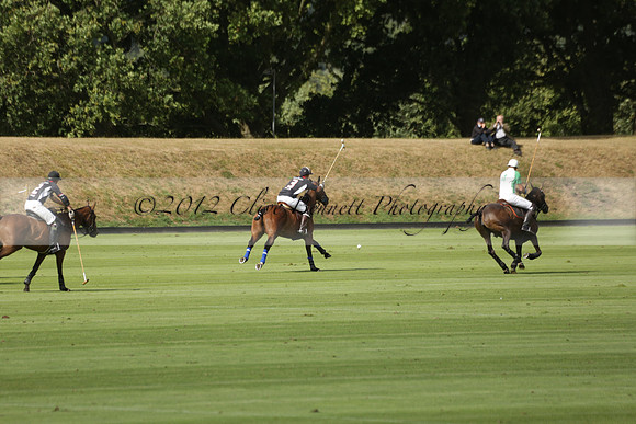 Jaeger Le Coultre (black)  v Wairakei Pastoral (white) in a Jaeger Le Coultre Holden White Cup polo match played on 29 July 2013 at Cowdray Park Polo Club on Brooksfieldwww.polopictures.co.uk