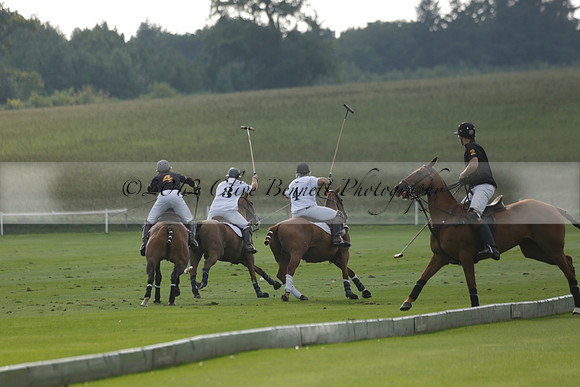 Pluma Negra (white) v Shoreline (black) in the Brecknock Cup Subsidiary final polo match played on Sunday 25 August 2013 at Cowdray Park Polo Club on Ambersham 1. 2013.10.12 www.polopictures.co.uk
