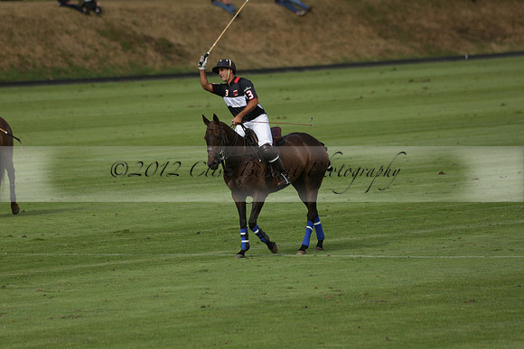 Jaeger Le Coultre (black)  v Wairakei Pastoral (white) in a Jaeger Le Coultre Holden White Cup polo match played on 29 July 2013 at Cowdray Park Polo Club on Brooksfieldwww.polopictures.co.uk