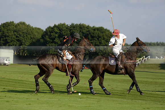 Pluma Negra (white) v Shoreline (black) in the Brecknock Cup Subsidiary final polo match played on Sunday 25 August 2013 at Cowdray Park Polo Club on Ambersham 1. 2013.10.12 www.polopictures.co.uk