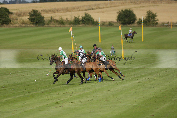 Jaeger Le Coultre (black)  v Wairakei Pastoral (white) in a Jaeger Le Coultre Holden White Cup polo match played on 29 July 2013 at Cowdray Park Polo Club on Brooksfieldwww.polopictures.co.uk