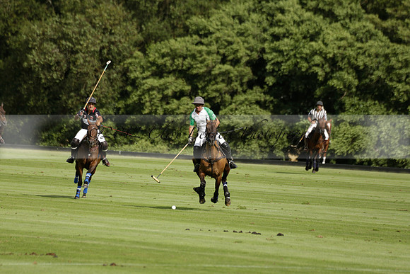 Jaeger Le Coultre (black)  v Wairakei Pastoral (white) in a Jaeger Le Coultre Holden White Cup polo match played on 29 July 2013 at Cowdray Park Polo Club on Brooksfieldwww.polopictures.co.uk