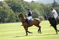 Pandas (white) v Home Farm (navy) in a Park House West Sussex Cup Polo match on Brooksfield at Cowdray Park Polo Club on Friday 30 August 2013. 2013.08.30 www.polopictures.co.uk