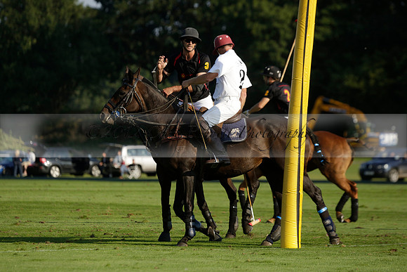Pluma Negra (white) v Shoreline (black) in the Brecknock Cup Subsidiary final polo match played on Sunday 25 August 2013 at Cowdray Park Polo Club on Ambersham 1. 2013.10.12 www.polopictures.co.uk