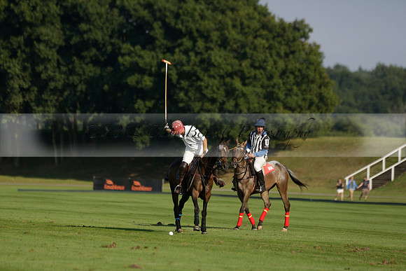 Pluma Negra (white) v Shoreline (black) in the Brecknock Cup Subsidiary final polo match played on Sunday 25 August 2013 at Cowdray Park Polo Club on Ambersham 1. 2013.10.12 www.polopictures.co.uk