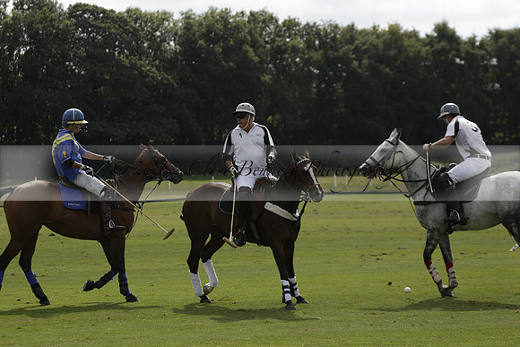 Combe Place (blue) v Silver Fox (white) in a Park House West Sussex Cup Polo match on Ambersham 1 at Cowdray Park Polo Club on Friday 30 August 2013. 2013.08.30 www.polopictures.co.uk