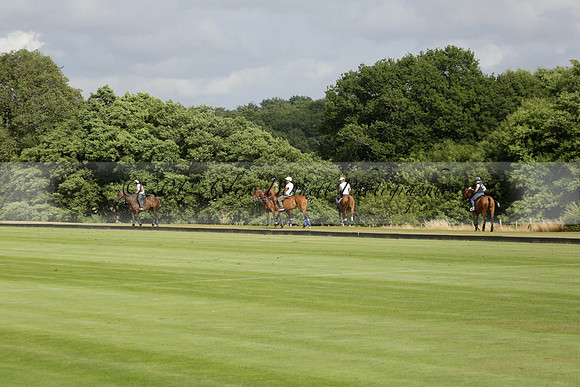 Jaeger Le Coultre (black)  v Wairakei Pastoral (white) in a Jaeger Le Coultre Holden White Cup polo match played on 29 July 2013 at Cowdray Park Polo Club on Brooksfieldwww.polopictures.co.uk