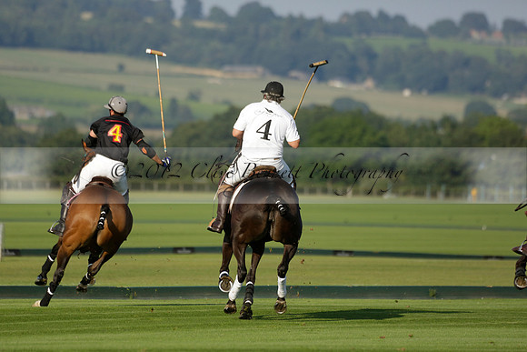 Pluma Negra (white) v Shoreline (black) in the Brecknock Cup Subsidiary final polo match played on Sunday 25 August 2013 at Cowdray Park Polo Club on Ambersham 1. 2013.10.12 www.polopictures.co.uk