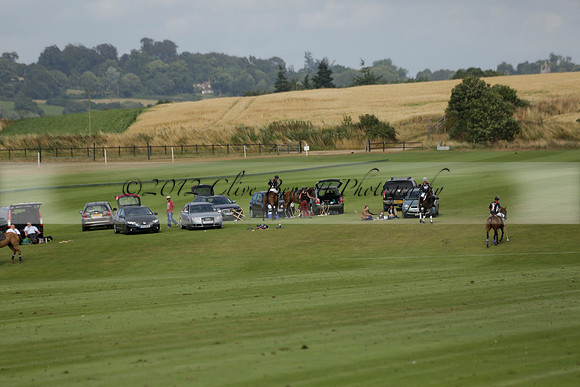 Jaeger Le Coultre (black)  v Wairakei Pastoral (white) in a Jaeger Le Coultre Holden White Cup polo match played on 29 July 2013 at Cowdray Park Polo Club on Brooksfieldwww.polopictures.co.uk