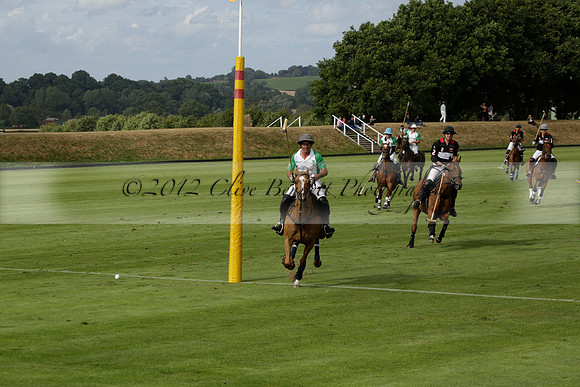 Jaeger Le Coultre (black)  v Wairakei Pastoral (white) in a Jaeger Le Coultre Holden White Cup polo match played on 29 July 2013 at Cowdray Park Polo Club on Brooksfieldwww.polopictures.co.uk