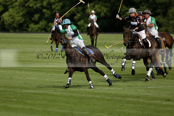 Jaeger Le Coultre (black)  v Wairakei Pastoral (white) in a Jaeger Le Coultre Holden White Cup polo match played on 29 July 2013 at Cowdray Park Polo Club on Brooksfieldwww.polopictures.co.uk