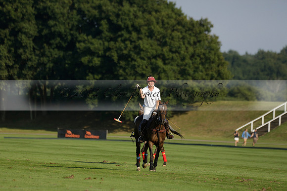 Pluma Negra (white) v Shoreline (black) in the Brecknock Cup Subsidiary final polo match played on Sunday 25 August 2013 at Cowdray Park Polo Club on Ambersham 1. 2013.10.12 www.polopictures.co.uk