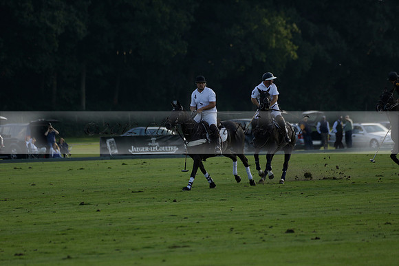 Pluma Negra (white) v Shoreline (black) in the Brecknock Cup Subsidiary final polo match played on Sunday 25 August 2013 at Cowdray Park Polo Club on Ambersham 1. 2013.10.12 www.polopictures.co.uk