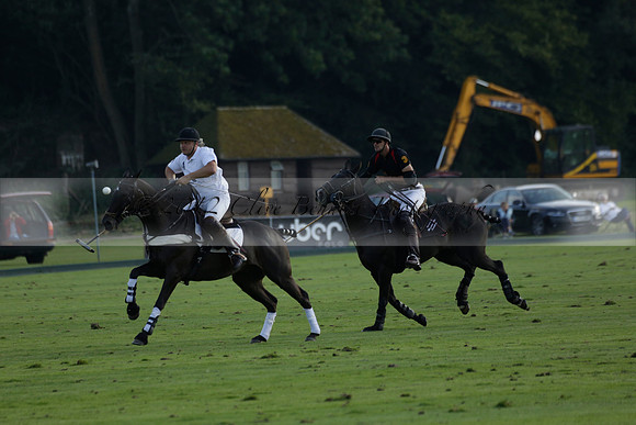 Pluma Negra (white) v Shoreline (black) in the Brecknock Cup Subsidiary final polo match played on Sunday 25 August 2013 at Cowdray Park Polo Club on Ambersham 1. 2013.10.12 www.polopictures.co.uk
