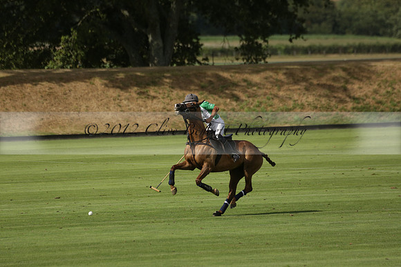 Jaeger Le Coultre (black)  v Wairakei Pastoral (white) in a Jaeger Le Coultre Holden White Cup polo match played on 29 July 2013 at Cowdray Park Polo Club on Brooksfieldwww.polopictures.co.uk