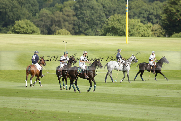 Pandas (white) v Home Farm (navy) in a Park House West Sussex Cup Polo match on Brooksfield at Cowdray Park Polo Club on Friday 30 August 2013. 2013.08.30 www.polopictures.co.uk