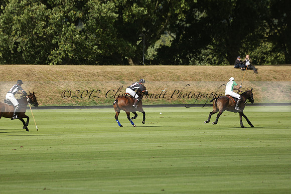 Jaeger Le Coultre (black)  v Wairakei Pastoral (white) in a Jaeger Le Coultre Holden White Cup polo match played on 29 July 2013 at Cowdray Park Polo Club on Brooksfieldwww.polopictures.co.uk
