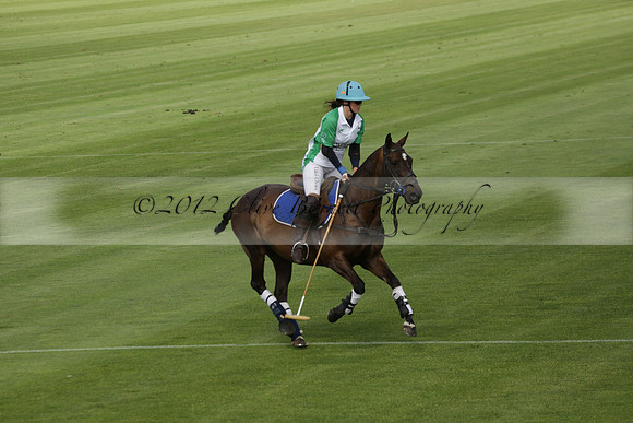 Jaeger Le Coultre (black)  v Wairakei Pastoral (white) in a Jaeger Le Coultre Holden White Cup polo match played on 29 July 2013 at Cowdray Park Polo Club on Brooksfieldwww.polopictures.co.uk