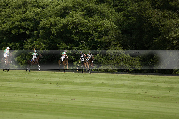 Jaeger Le Coultre (black)  v Wairakei Pastoral (white) in a Jaeger Le Coultre Holden White Cup polo match played on 29 July 2013 at Cowdray Park Polo Club on Brooksfieldwww.polopictures.co.uk