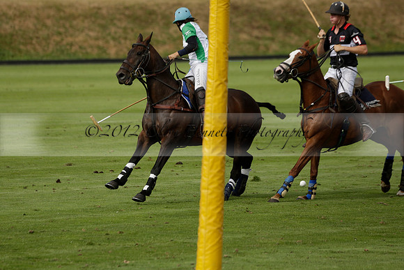 Jaeger Le Coultre (black)  v Wairakei Pastoral (white) in a Jaeger Le Coultre Holden White Cup polo match played on 29 July 2013 at Cowdray Park Polo Club on Brooksfieldwww.polopictures.co.uk