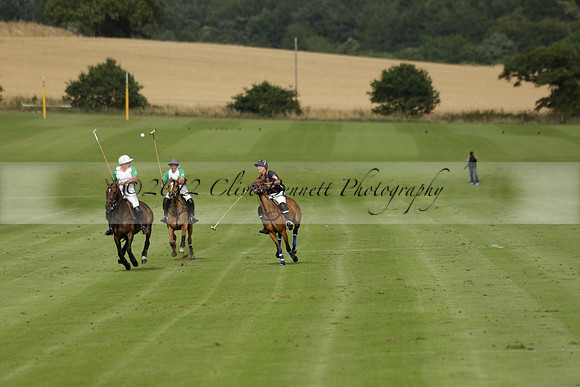 Jaeger Le Coultre (black)  v Wairakei Pastoral (white) in a Jaeger Le Coultre Holden White Cup polo match played on 29 July 2013 at Cowdray Park Polo Club on Brooksfieldwww.polopictures.co.uk