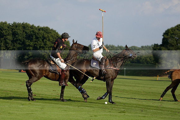 Pluma Negra (white) v Shoreline (black) in the Brecknock Cup Subsidiary final polo match played on Sunday 25 August 2013 at Cowdray Park Polo Club on Ambersham 1. 2013.10.12 www.polopictures.co.uk