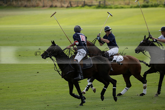 Pandas (white) v Home Farm (navy) in a Park House West Sussex Cup Polo match on Brooksfield at Cowdray Park Polo Club on Friday 30 August 2013. 2013.08.30 www.polopictures.co.uk