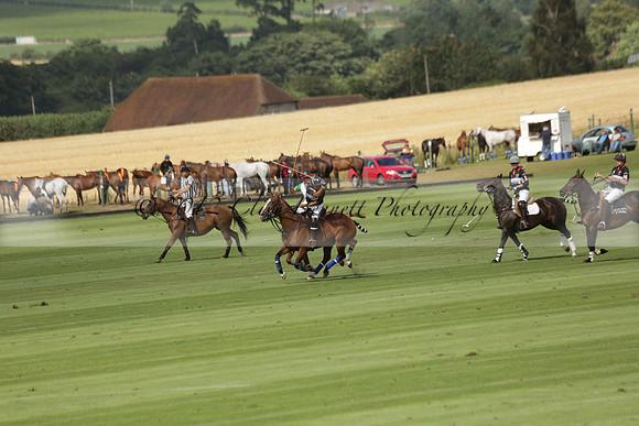 Jaeger Le Coultre (black)  v Wairakei Pastoral (white) in a Jaeger Le Coultre Holden White Cup polo match played on 29 July 2013 at Cowdray Park Polo Club on Brooksfieldwww.polopictures.co.uk