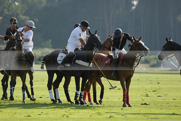 Pluma Negra (white) v Shoreline (black) in the Brecknock Cup Subsidiary final polo match played on Sunday 25 August 2013 at Cowdray Park Polo Club on Ambersham 1. 2013.10.12 www.polopictures.co.uk