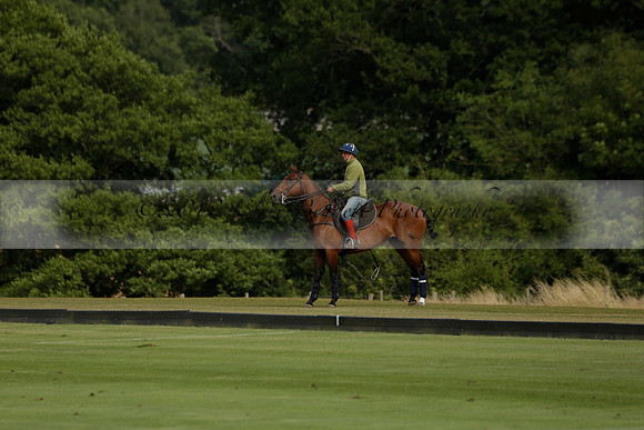 Jaeger Le Coultre (black)  v Wairakei Pastoral (white) in a Jaeger Le Coultre Holden White Cup polo match played on 29 July 2013 at Cowdray Park Polo Club on Brooksfieldwww.polopictures.co.uk