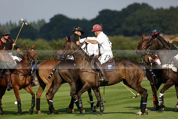 Pluma Negra (white) v Shoreline (black) in the Brecknock Cup Subsidiary final polo match played on Sunday 25 August 2013 at Cowdray Park Polo Club on Ambersham 1. 2013.10.12 www.polopictures.co.uk