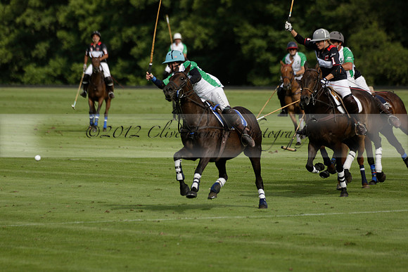 Jaeger Le Coultre (black)  v Wairakei Pastoral (white) in a Jaeger Le Coultre Holden White Cup polo match played on 29 July 2013 at Cowdray Park Polo Club on Brooksfieldwww.polopictures.co.uk