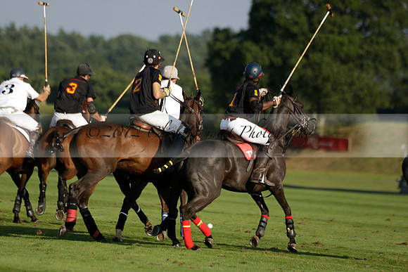 Pluma Negra (white) v Shoreline (black) in the Brecknock Cup Subsidiary final polo match played on Sunday 25 August 2013 at Cowdray Park Polo Club on Ambersham 1. 2013.10.12 www.polopictures.co.uk
