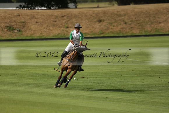 Jaeger Le Coultre (black)  v Wairakei Pastoral (white) in a Jaeger Le Coultre Holden White Cup polo match played on 29 July 2013 at Cowdray Park Polo Club on Brooksfieldwww.polopictures.co.uk