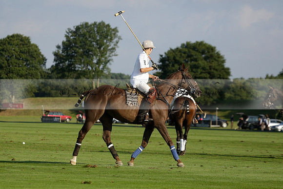 Pluma Negra (white) v Shoreline (black) in the Brecknock Cup Subsidiary final polo match played on Sunday 25 August 2013 at Cowdray Park Polo Club on Ambersham 1. 2013.10.12 www.polopictures.co.uk