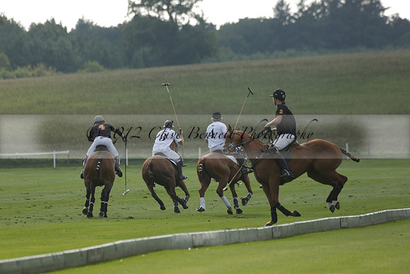 Pluma Negra (white) v Shoreline (black) in the Brecknock Cup Subsidiary final polo match played on Sunday 25 August 2013 at Cowdray Park Polo Club on Ambersham 1. 2013.10.12 www.polopictures.co.uk