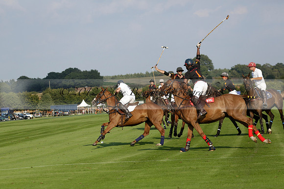 Pluma Negra (white) v Shoreline (black) in the Brecknock Cup Subsidiary final polo match played on Sunday 25 August 2013 at Cowdray Park Polo Club on Ambersham 1. 2013.10.12 www.polopictures.co.uk