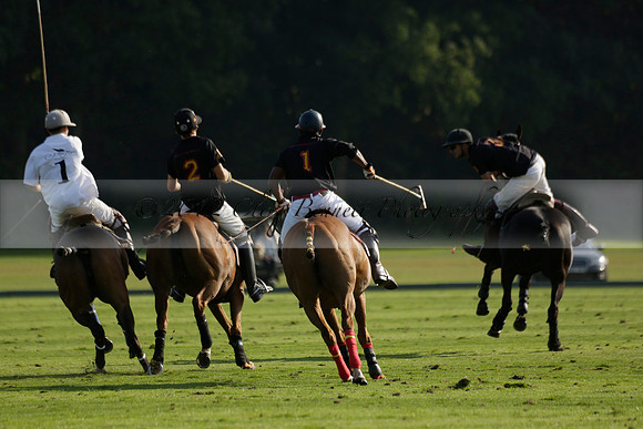 Pluma Negra (white) v Shoreline (black) in the Brecknock Cup Subsidiary final polo match played on Sunday 25 August 2013 at Cowdray Park Polo Club on Ambersham 1. 2013.10.12 www.polopictures.co.uk