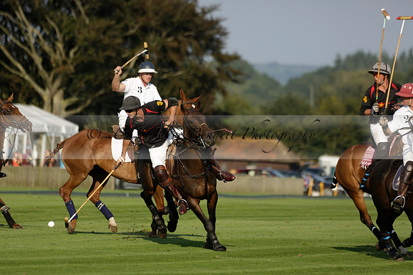 Pluma Negra (white) v Shoreline (black) in the Brecknock Cup Subsidiary final polo match played on Sunday 25 August 2013 at Cowdray Park Polo Club on Ambersham 1. 2013.10.12 www.polopictures.co.uk