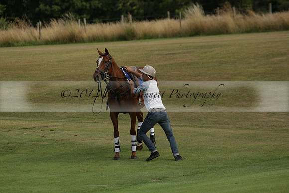 Jaeger Le Coultre (black)  v Wairakei Pastoral (white) in a Jaeger Le Coultre Holden White Cup polo match played on 29 July 2013 at Cowdray Park Polo Club on Brooksfieldwww.polopictures.co.uk