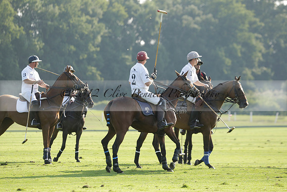 Pluma Negra (white) v Shoreline (black) in the Brecknock Cup Subsidiary final polo match played on Sunday 25 August 2013 at Cowdray Park Polo Club on Ambersham 1. 2013.10.12 www.polopictures.co.uk