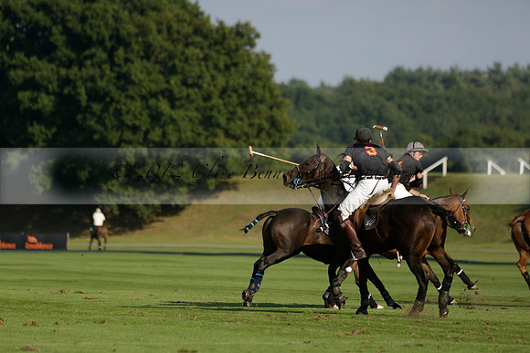 Pluma Negra (white) v Shoreline (black) in the Brecknock Cup Subsidiary final polo match played on Sunday 25 August 2013 at Cowdray Park Polo Club on Ambersham 1. 2013.10.12 www.polopictures.co.uk