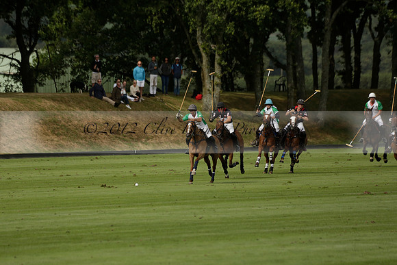 Jaeger Le Coultre (black)  v Wairakei Pastoral (white) in a Jaeger Le Coultre Holden White Cup polo match played on 29 July 2013 at Cowdray Park Polo Club on Brooksfieldwww.polopictures.co.uk