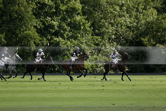 Pandas (white) v Home Farm (navy) in a Park House West Sussex Cup Polo match on Brooksfield at Cowdray Park Polo Club on Friday 30 August 2013. 2013.08.30 www.polopictures.co.uk