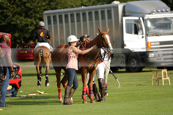 Pluma Negra (white) v Shoreline (black) in the Brecknock Cup Subsidiary final polo match played on Sunday 25 August 2013 at Cowdray Park Polo Club on Ambersham 1. 2013.10.12 www.polopictures.co.uk