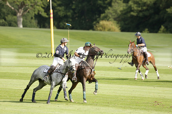 Pandas (white) v Home Farm (navy) in a Park House West Sussex Cup Polo match on Brooksfield at Cowdray Park Polo Club on Friday 30 August 2013. 2013.08.30 www.polopictures.co.uk