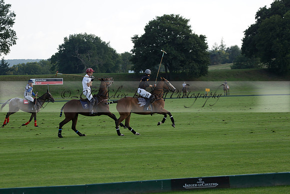 Pluma Negra (white) v Shoreline (black) in the Brecknock Cup Subsidiary final polo match played on Sunday 25 August 2013 at Cowdray Park Polo Club on Ambersham 1. 2013.10.12 www.polopictures.co.uk
