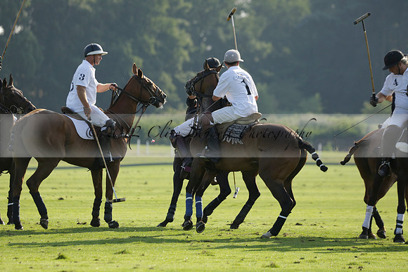 Pluma Negra (white) v Shoreline (black) in the Brecknock Cup Subsidiary final polo match played on Sunday 25 August 2013 at Cowdray Park Polo Club on Ambersham 1. 2013.10.12 www.polopictures.co.uk