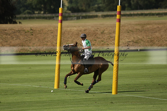Jaeger Le Coultre (black)  v Wairakei Pastoral (white) in a Jaeger Le Coultre Holden White Cup polo match played on 29 July 2013 at Cowdray Park Polo Club on Brooksfieldwww.polopictures.co.uk