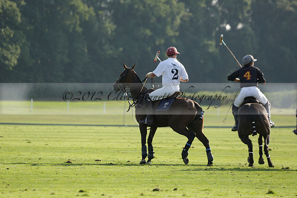 Pluma Negra (white) v Shoreline (black) in the Brecknock Cup Subsidiary final polo match played on Sunday 25 August 2013 at Cowdray Park Polo Club on Ambersham 1. 2013.10.12 www.polopictures.co.uk